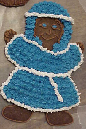 A close up of Mary. She looked like an Eskimo until we added the white icing lining. :>