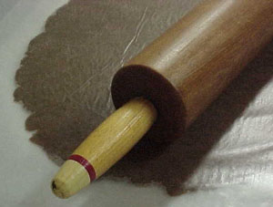 Then we made gingerbread and rolled it out. This project took six batches of gingerbread.