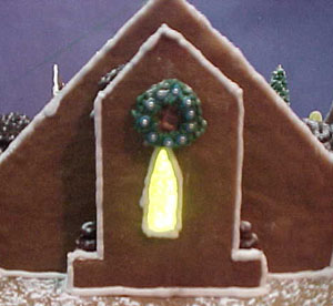 Close up of the wreath and a stained glass window.