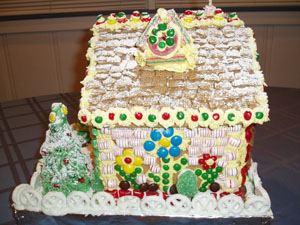 Shaya started the design of this side with the big blue flower. Kaitlyn filled in the flowers on the left and ride, and Meleta covered the wall with peppermints. Yummy!