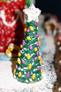 In the front yard is a decorated tree.