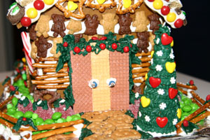 The front door. Notice the wreath across the top and the cookie path. Silver balls make great door handles!