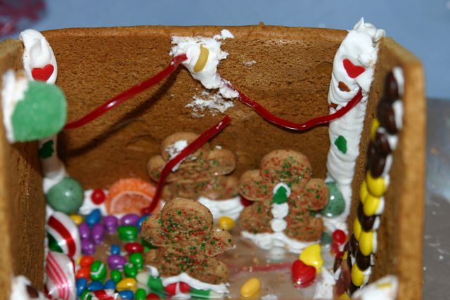 Gingerbread people inside with holiday decorations.