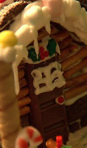 Kaitlyn's front door - notice the icing lattice window and the holly above the door.