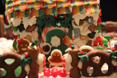 Side door of the church with little gingerbread cake decorating people going in. Pretty fancy door!