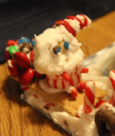 Shaya's Santa and his bag of toys along with a cool sled of candy canes and graham crackers!
