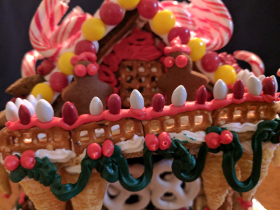 This house had a balcony. Julie added the wreathing.